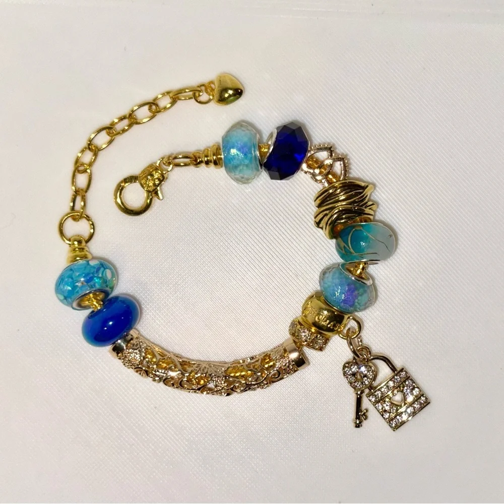Elegant Gold and Blue Charm Bracelet